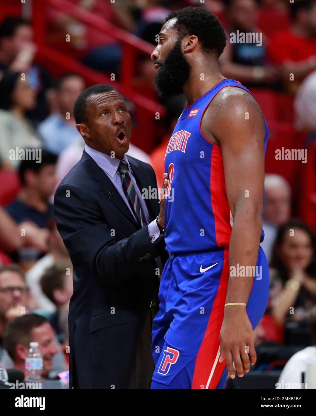 Detroit Pistons head coach Dwane Casey talks with center Andre Drummond