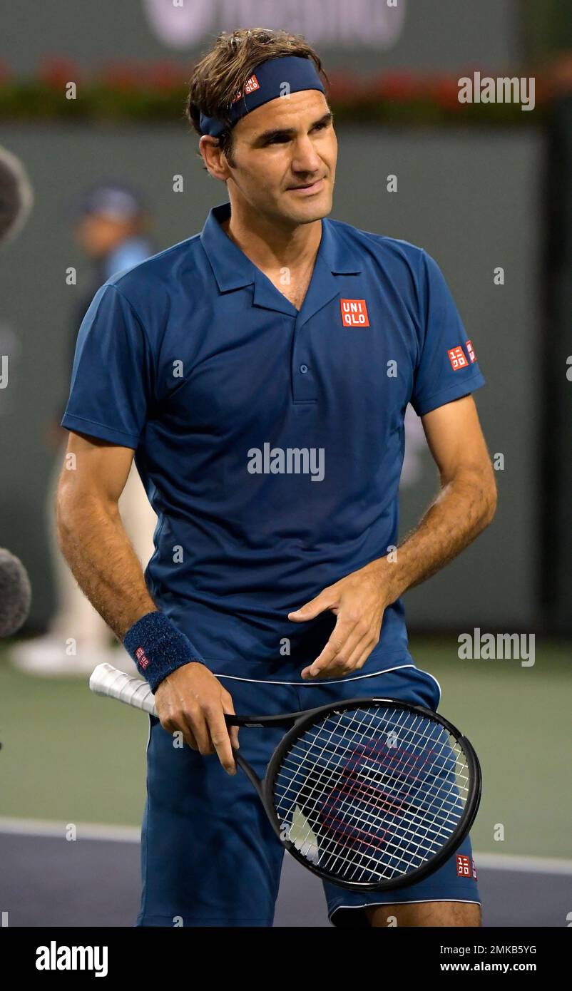 Roger Federer, of Switzerland, celebrates after winning the match against  Stan Wawrinka at the BNP Paribas Open tennis tournament Tuesday, March 12,  2019 in Indian Wells, Calif. (AP Photo/Mark J. Terrill Stock