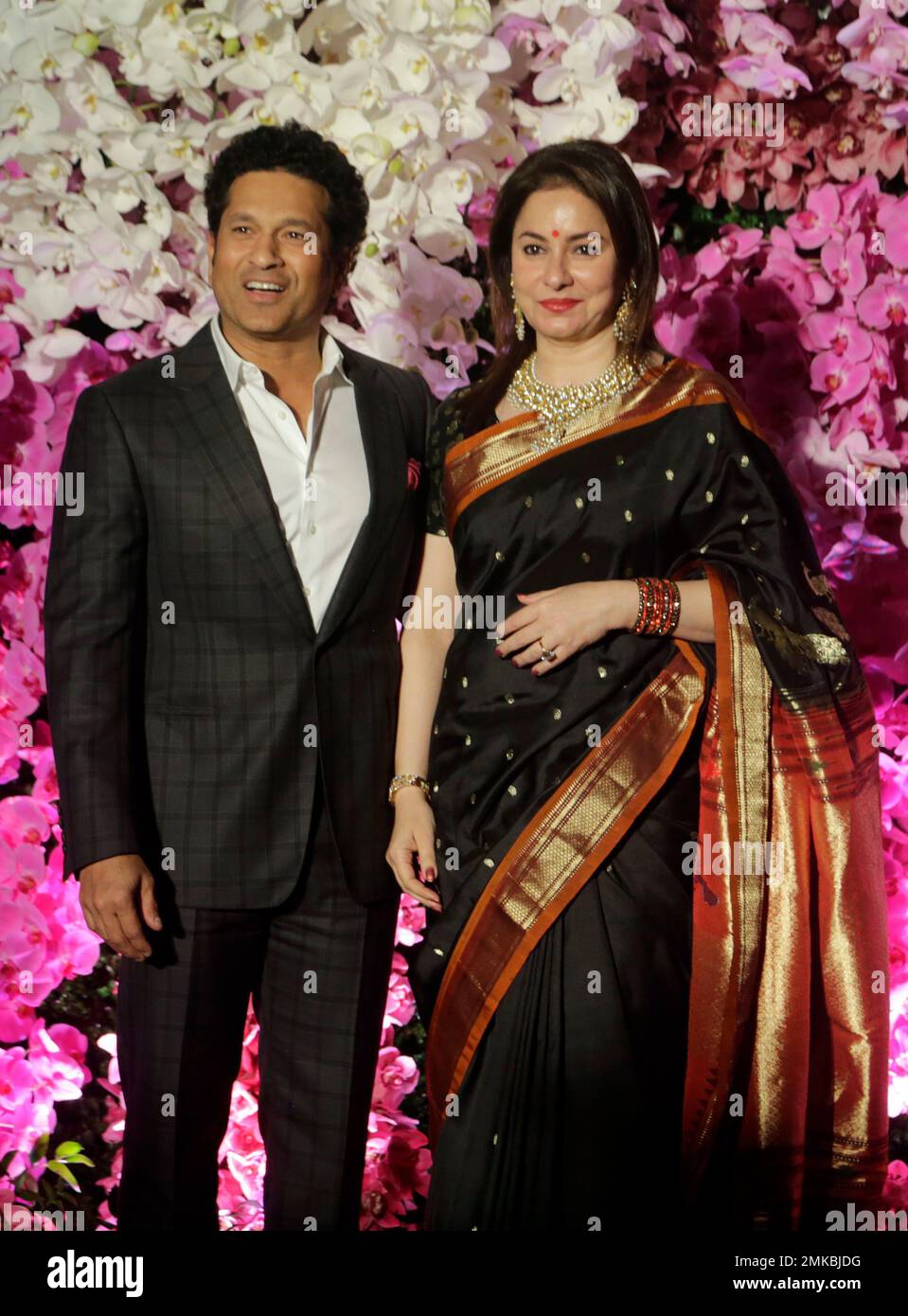 Sachin Tendulkar with wife Anjali poses during Akash Ambani's wedding  reception in Mumbai, India, Sunday, March. 10, 2019.(AP Photo/Rajanish  Kakade Stock Photo - Alamy, image size:959x1390