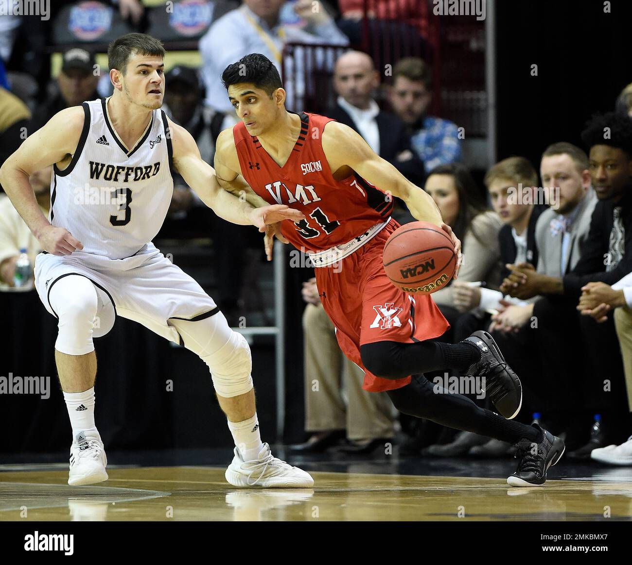 Virginia Military guard Sarju Patel (31) drives the ball against