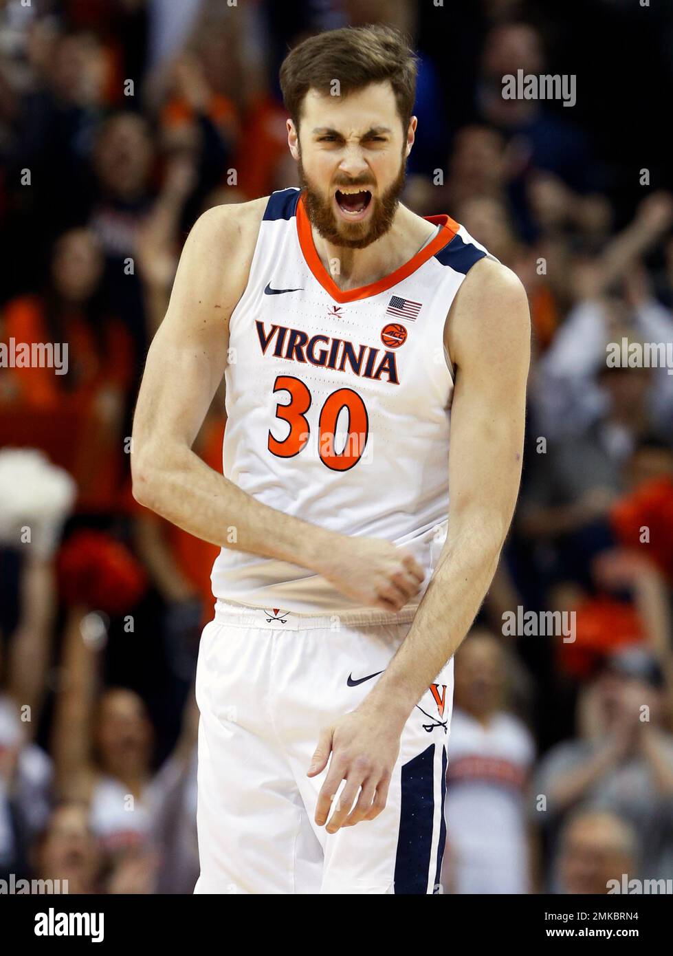 Virginia forward Jay Huff (30) reacts to a basket and a foul during the  first half of an NCAA college basketball game in Charlottesville, Va.,  Saturday, March 9, 2019. (AP Photo/Steve Helber