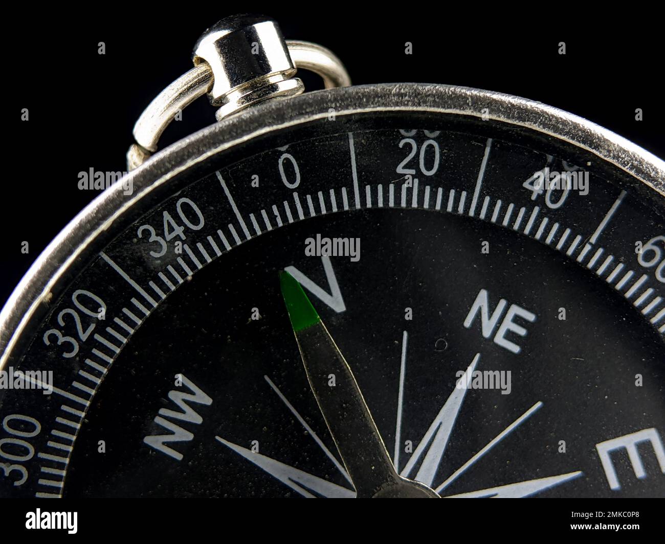 Silver Compass On Map Open compass map hi-res stock photography and images - Alamy