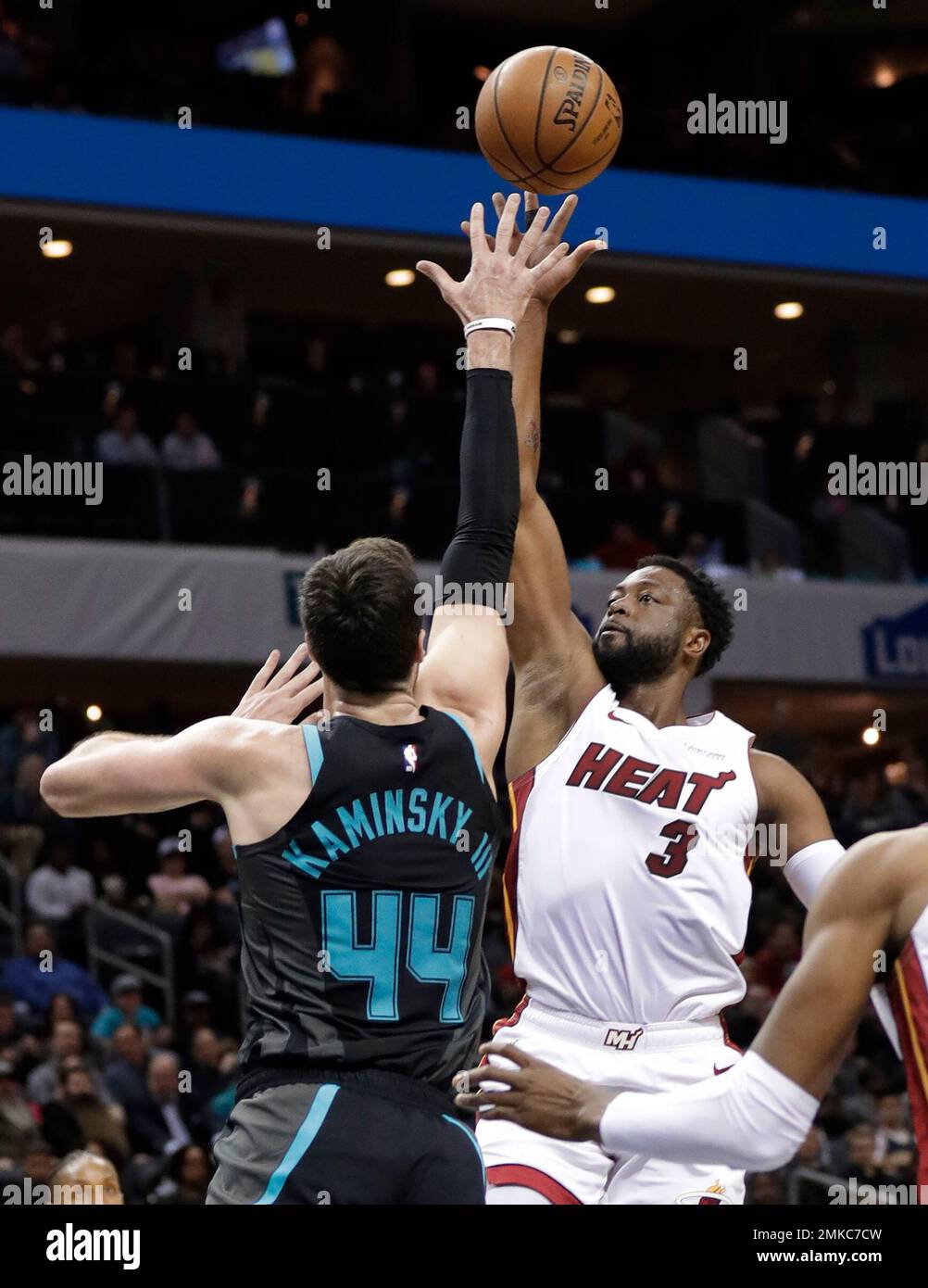 Miami Heat's Dwyane Wade (3) shoots over Charlotte Hornets' Frank ...