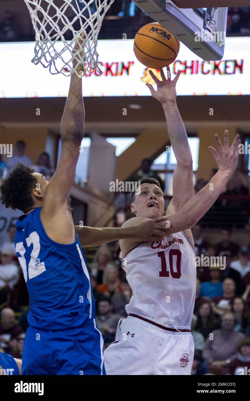 Charleston forward Ante Brzovic (10) lays the ball up while being