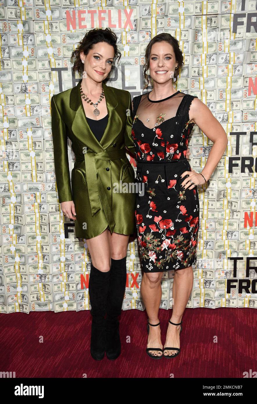 Actress Kimberly WilliamsPaisley, left, and sister Ashley Williams