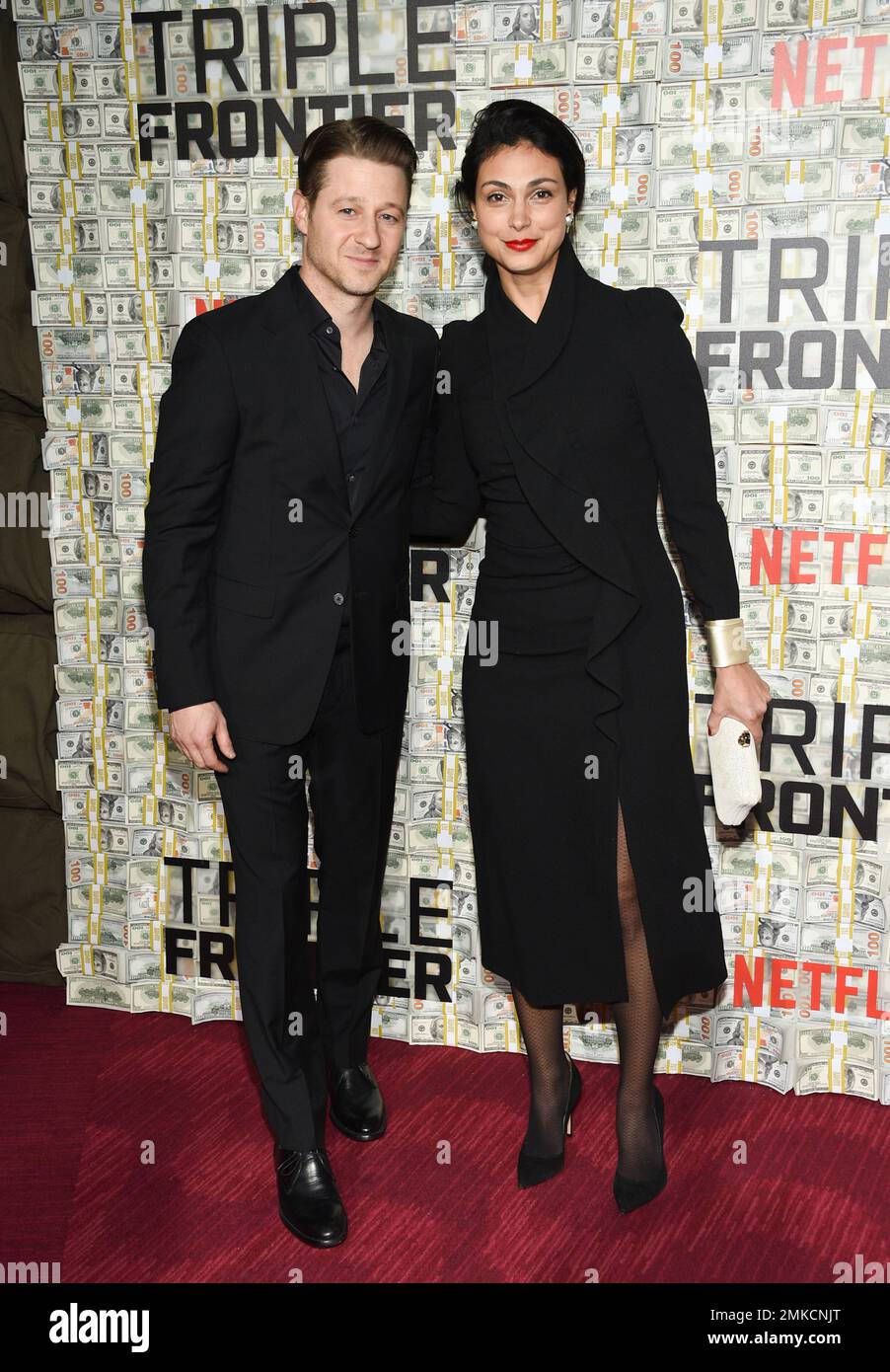 Actors Ben McKenzie, left, and wife Morena Baccarin attend the world