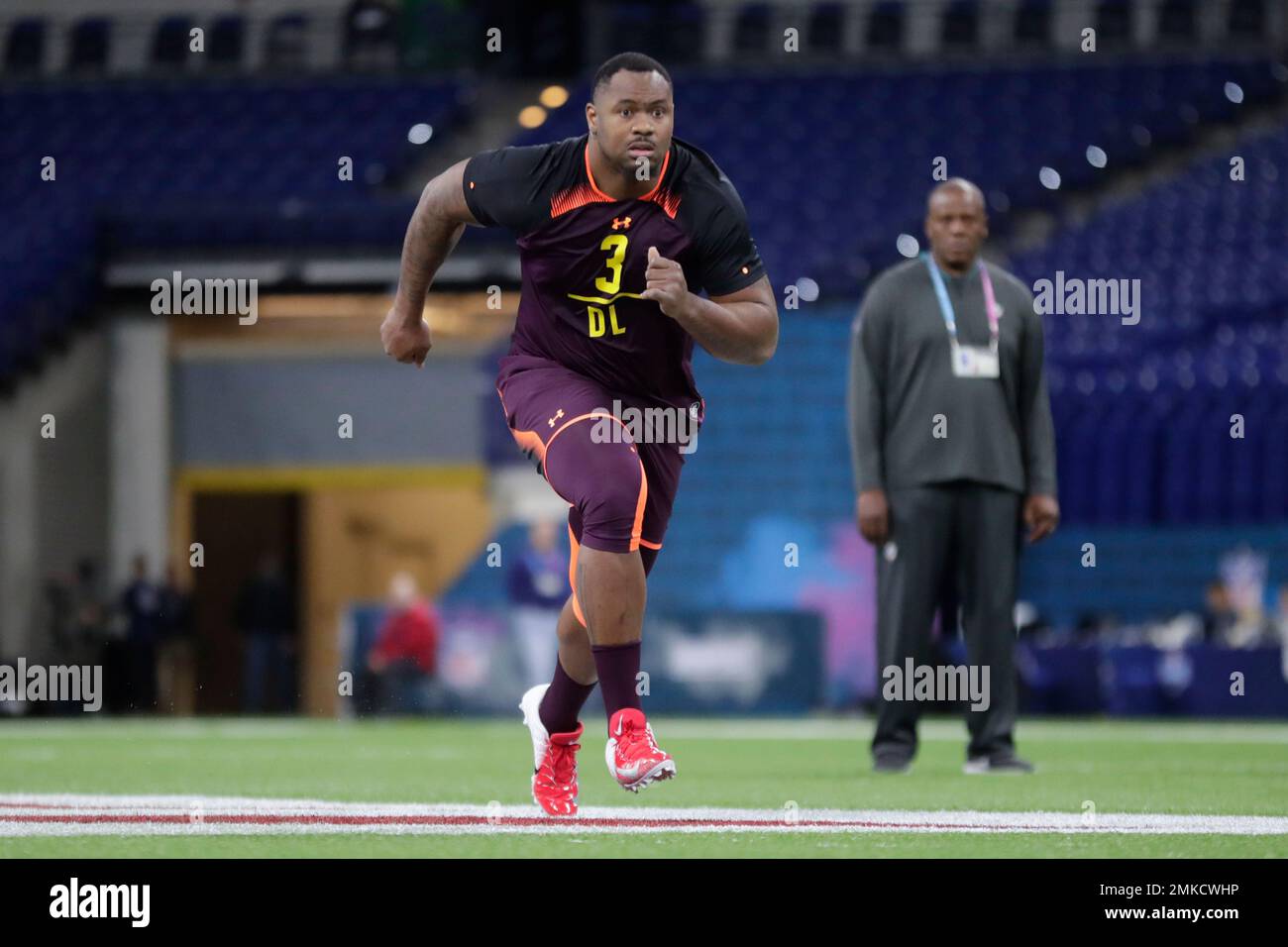 Florida State defensive lineman Demarcus Christmas runs a drill at the