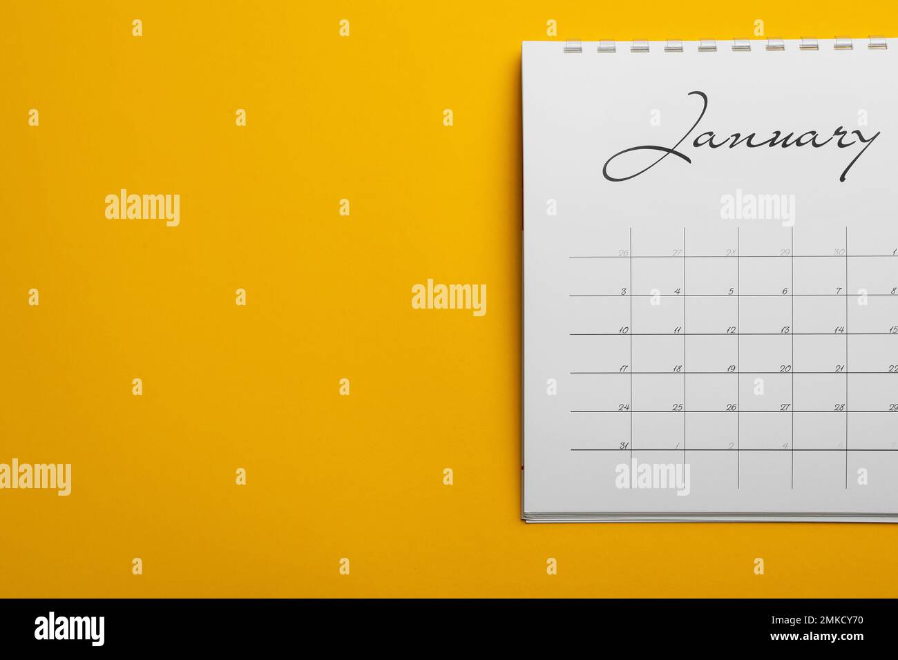 January calendar on yellow background, top view. Space for text Stock ...