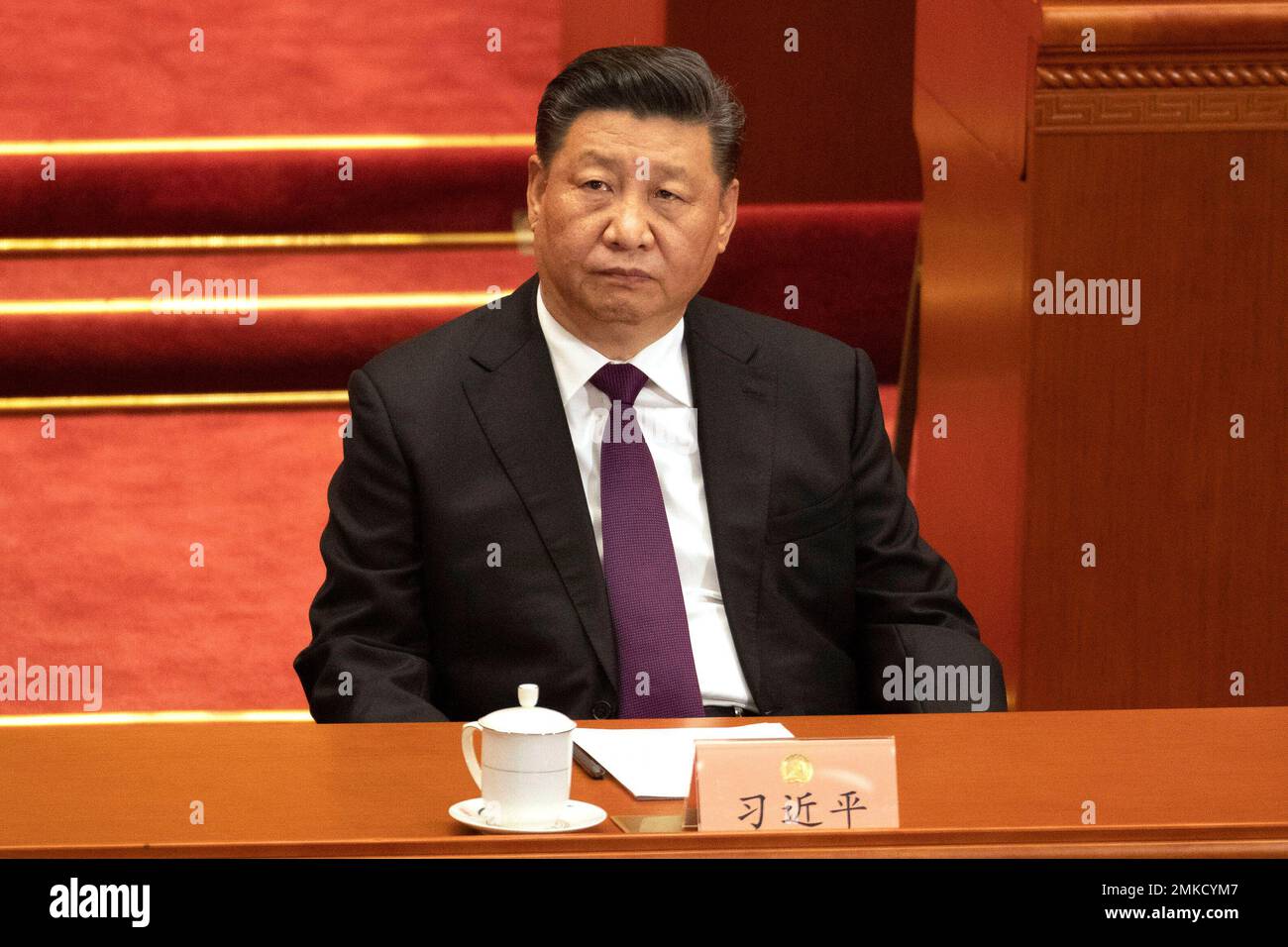 Chinese President Xi Jinping attends the opening session of the Chinese ...