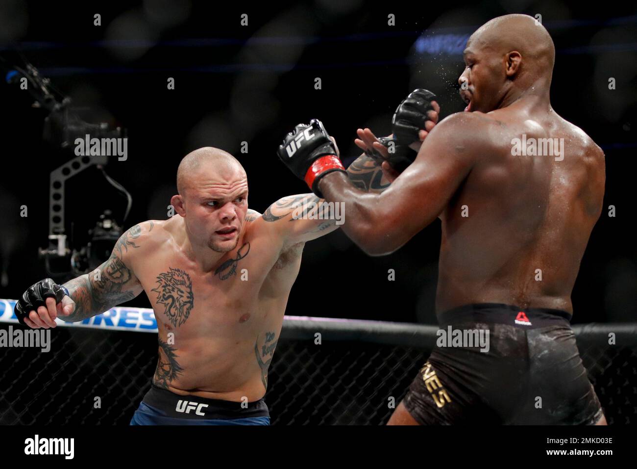 Anthony Smith left hits Jon Jones in a light heavyweight mixed martial arts title bout at UFC 235 Saturday March 2 2019 in Las Vegas. AP Photo John Locher Stock Photo Alamy