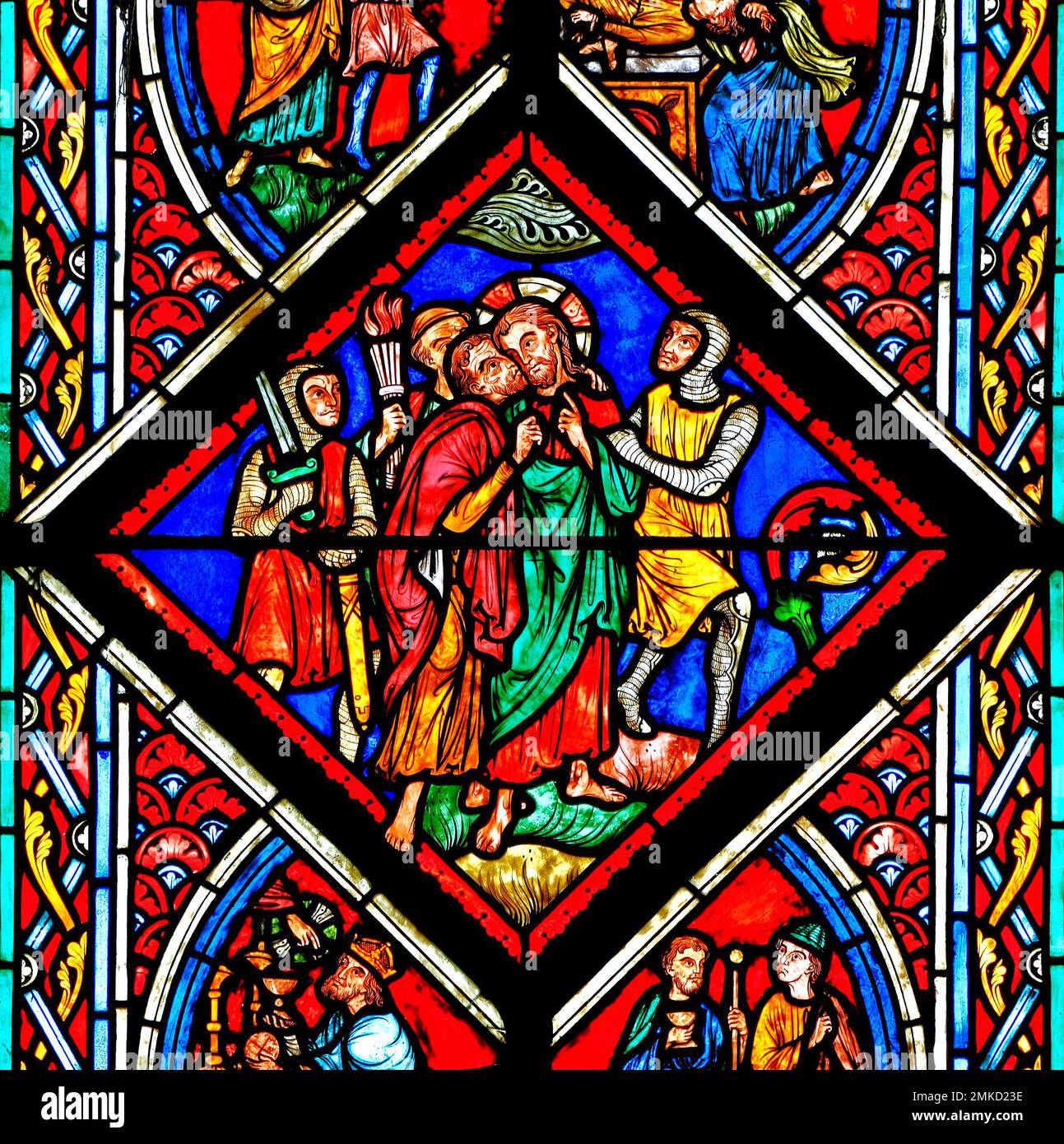 Judas betrays Jesus, with a kiss, in the Garden of Gethsemane, stained glass by Didron of Paris, 1860, Feltwell, Norfolk, detail from The Passion Stock Photo