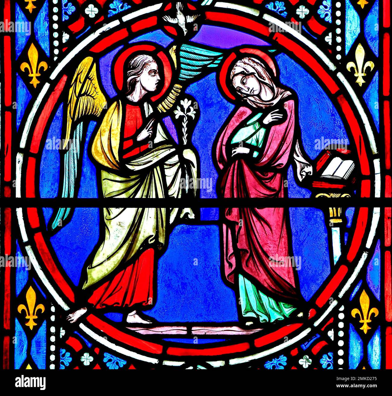 Nativity Window, stained glass, by Oudinot of Paris, 1861, Feltwell Church, Norfolk. Annunciation by Archangel Gabriel to Virgin Mary Stock Photo