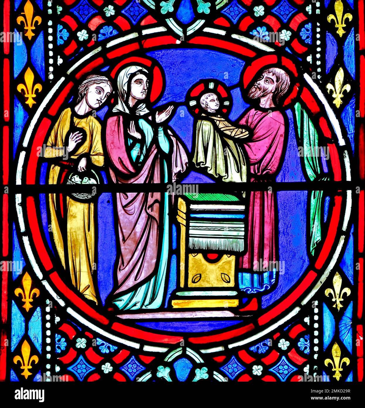 Nativity Window, stained glass by Oudinot of Paris, 1861, Feltwell Church, Norfolk, Presentation of the infant Jesus at the Temple in Jerusalem Stock Photo