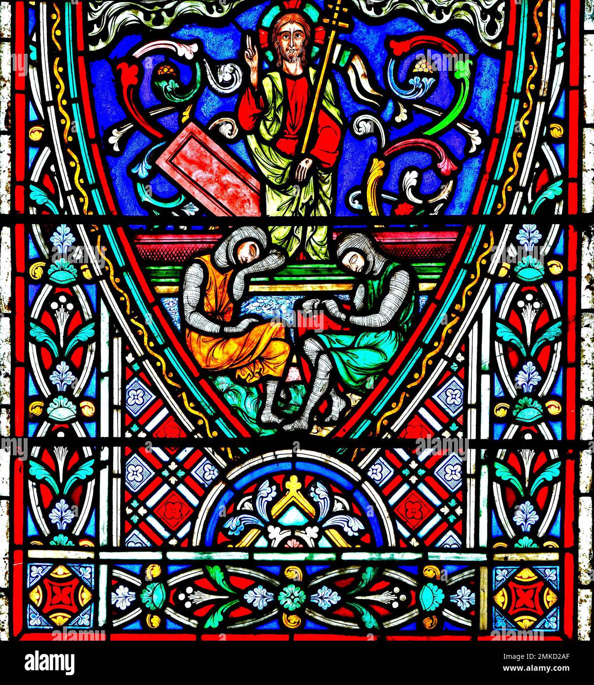 Resurrection Of Christ, while Roman guards sleep, stained glass window, by Didron of Paris, 1860, Story of Easter, Feltwell, Norfolk, England, UK Stock Photo