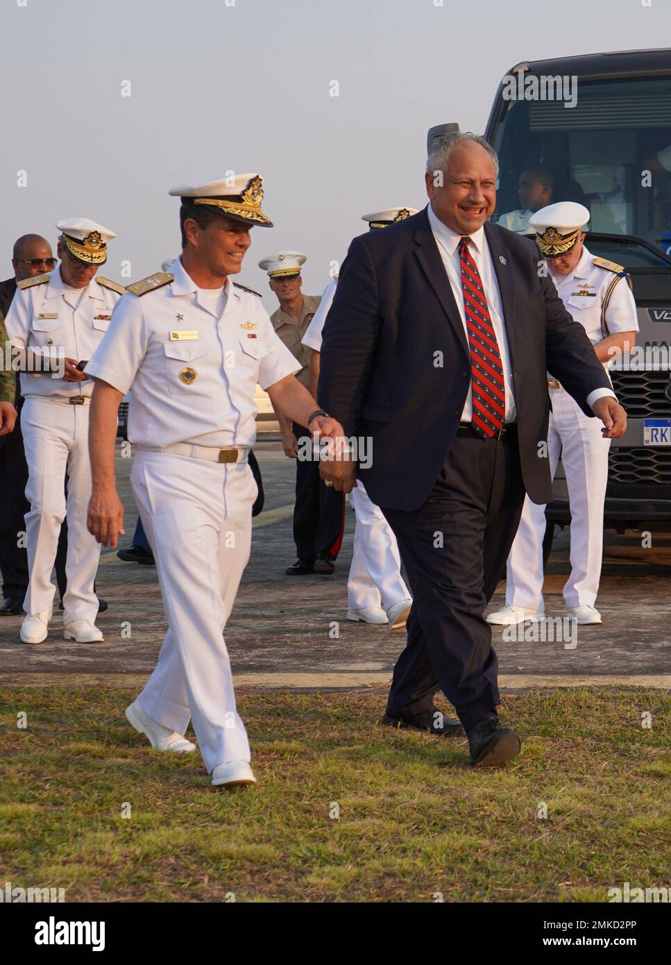 Vice-Almirante Chagas Vianna Braga (Vice Admiral Brazilian Marine Corps), left, Brazilian fleet marine force commander, escorts U.S. Secretary of the Navy Carlos Del Toro, right, to the reviewing stand to observe a multinational amphibious assault demonstration at Ilha do Governador, Rio de Janeiro, on the official opening day of UNITAS LXIII, Sept. 8, 2022. For the last 63 year, UNITAS has developed and sustained relationships that improve the capacity of our reemerging and enduring maritime partners to achieve common objectives. Additionally, the military-to-military exchanges foster friendl Stock Photo