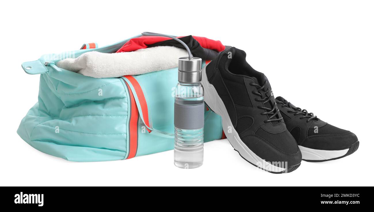 Sports bag with gym equipment on white background Stock Photo - Alamy