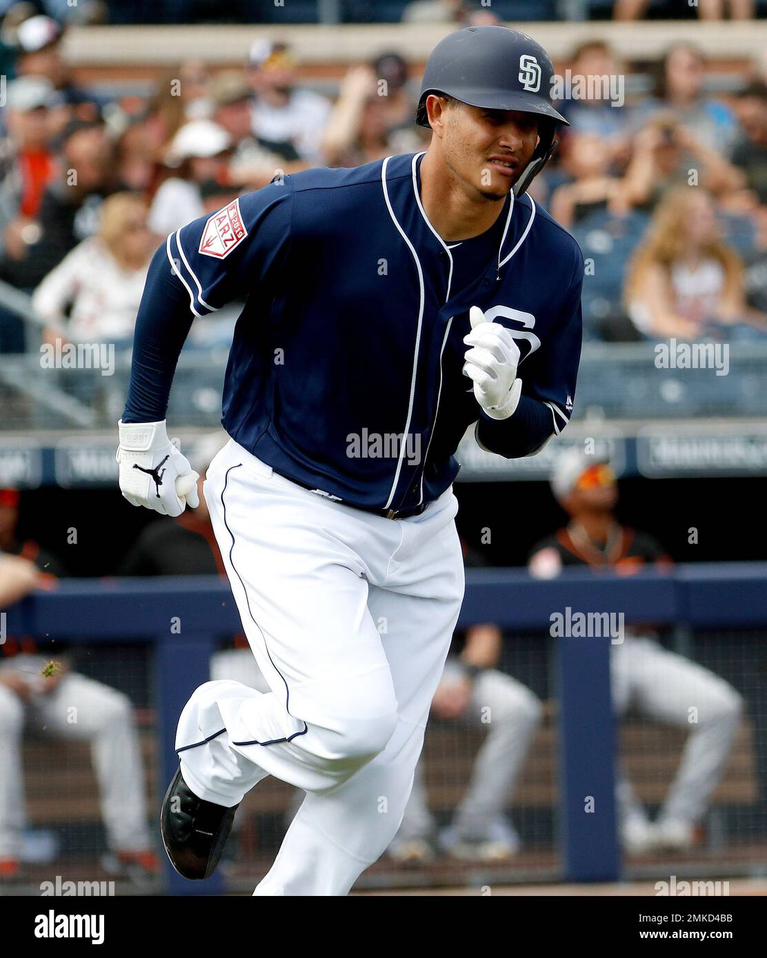 San Diego Padres' Manny Machado hits against the San Francisco Giants  during the first inning of a spring training baseball game, Saturday, March  2, 2019, in Peoria, Ariz. (AP Photo/Matt York Stock