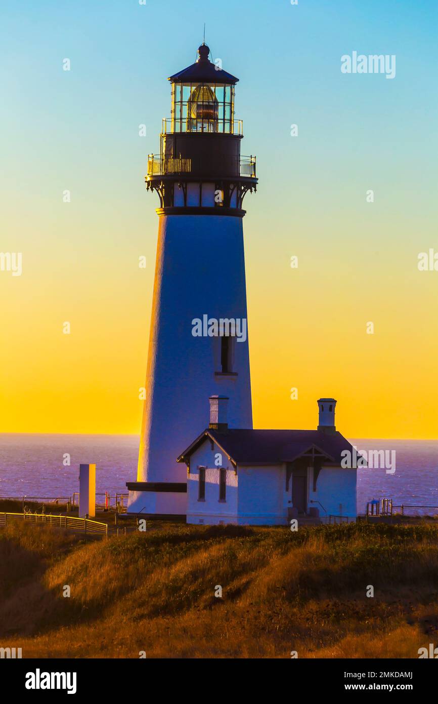 Sunset At Yaquina Head Lighthouse Stock Photo - Alamy