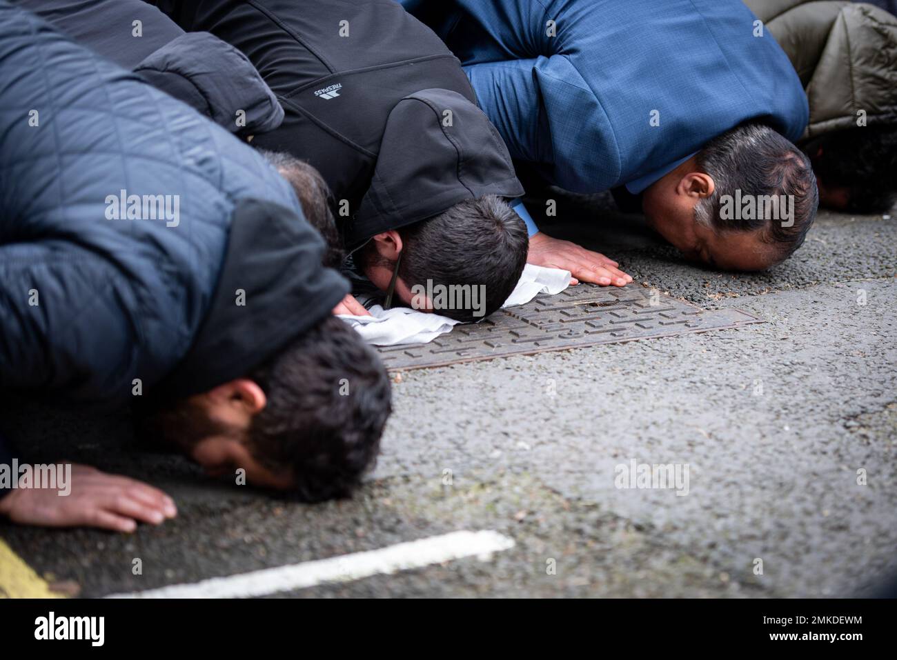 London, UK. 28th Jan, 2023. Protestors pray on the street during the demonstration against the Quran Burning In Sweden. The high representative of the United Nations Alliance of Civilizations has condemned the burning of the Muslim holy book by a Swedish-Danish far-right politician as a 'vile act''. Rasmus Paludan, leader of the Danish far-right political party Hard Line, carried out the stunt outside the Turkish embassy in Sweden under the protection of local police on Friday 27 January 2023. (Credit Image: © Loredana Sangiuliano/SOPA Images via ZUMA Press Wire) EDITORIAL USA Stock Photo