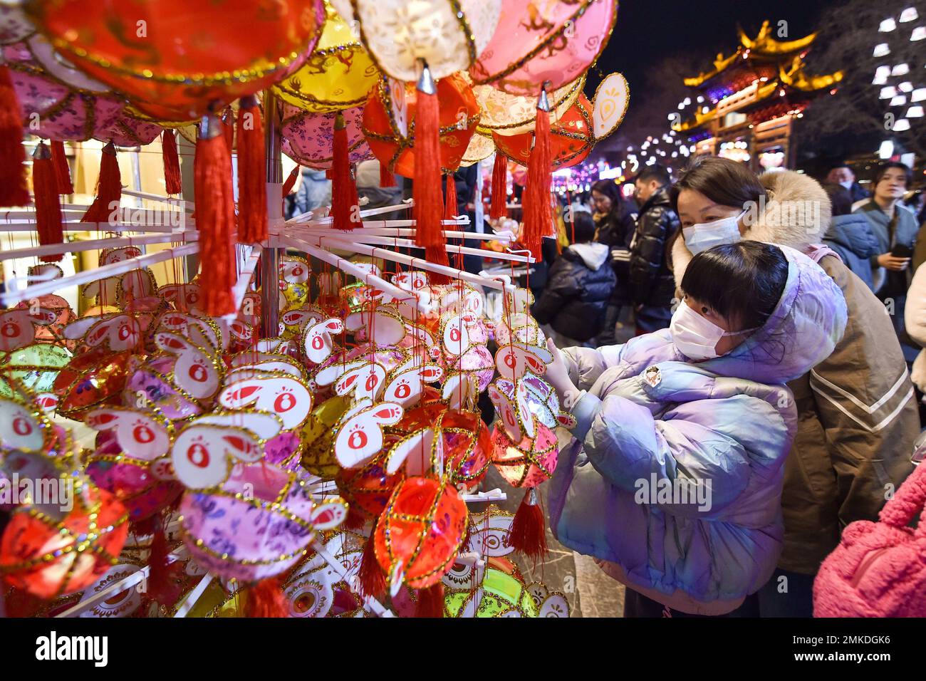 NANJING, CHINA - JANUARY 28, 2023 - Tourists choose lanterns for the ...