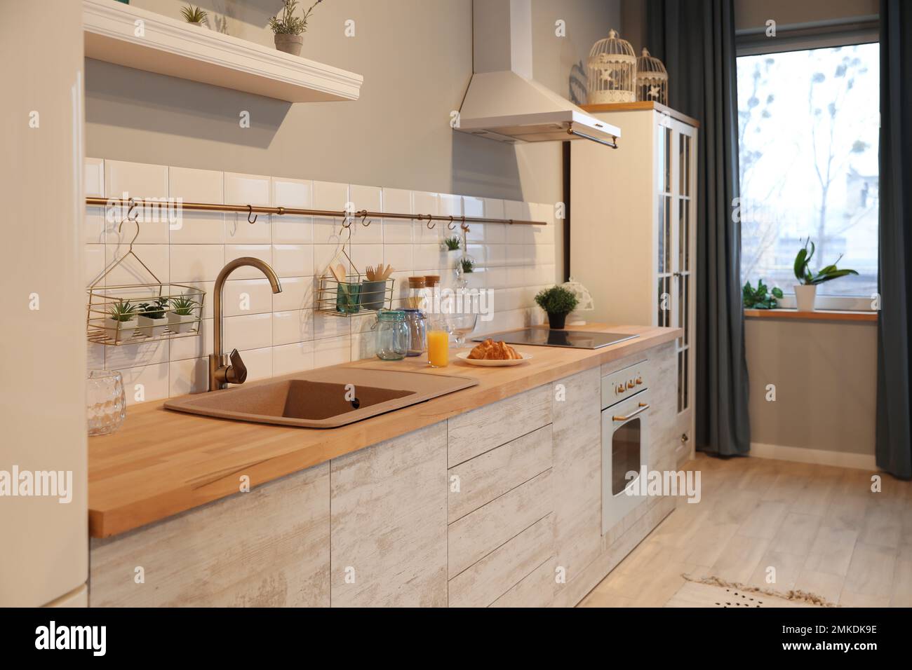 Modern kitchen interior with new stylish furniture Stock Photo - Alamy
