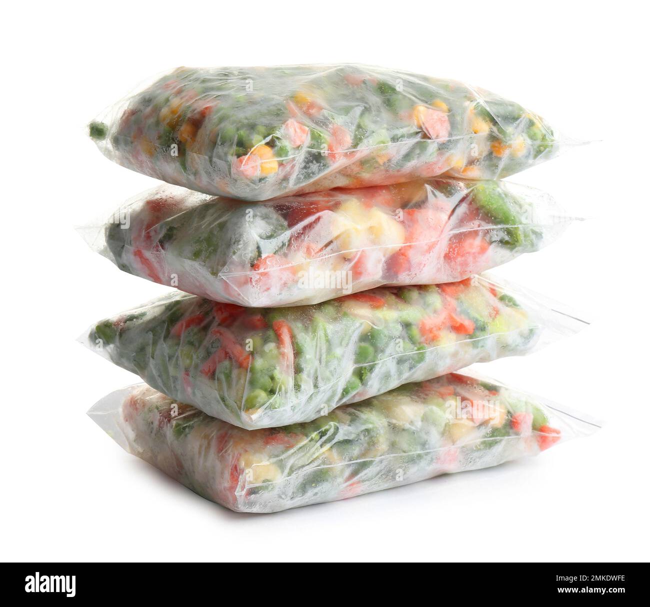 Frozen vegetables in plastic bags isolated on white Stock Photo