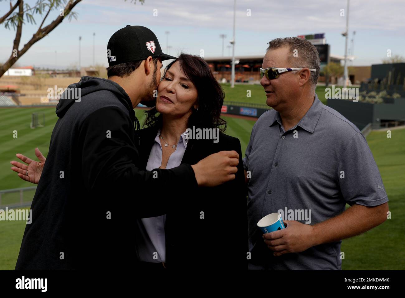 Colorado Rockies third baseman Nolan Arenado hugs his mom, Millie