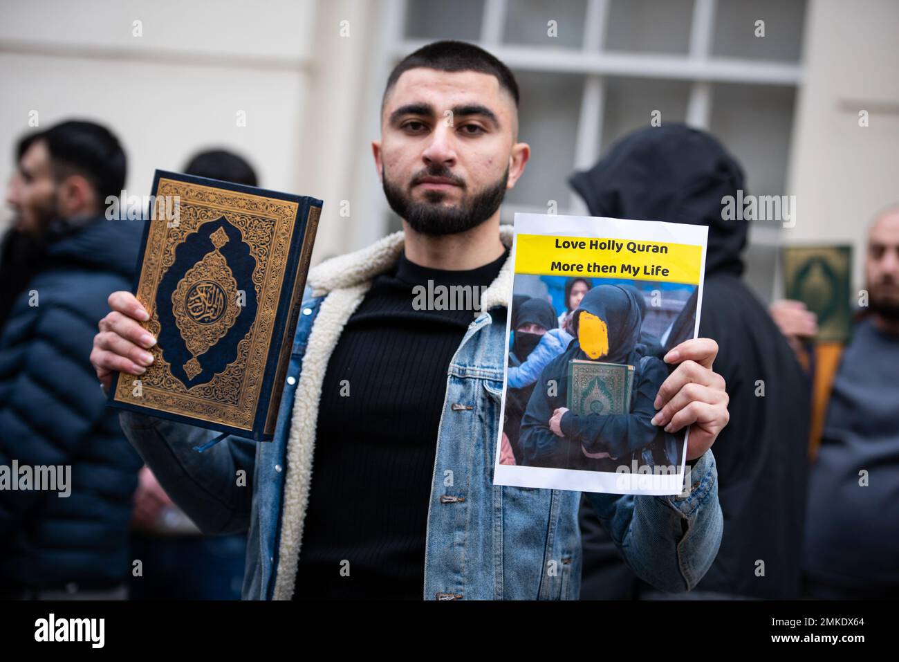 London, UK. 28th Jan, 2023. A protestor holds the Quran during the demonstration against the Quran Burning In Sweden. The high representative of the United Nations Alliance of Civilizations has condemned the burning of the Muslim holy book by a Swedish-Danish far-right politician as a 'vile act''. Rasmus Paludan, leader of the Danish far-right political party Hard Line, carried out the stunt outside the Turkish embassy in Sweden under the protection of local police on Friday 27 January 2023. (Credit Image: © Loredana Sangiuliano/SOPA Images via ZUMA Press Wire) EDITORIAL USAGE Stock Photo