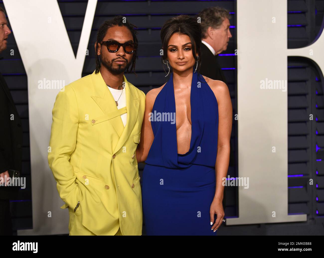 Miguel, left, and Nazanin Mandi arrive at the Vanity Fair Oscar Party