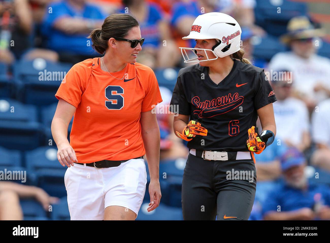 Syracuse head coach Shannon Doepking and Alicia Hansen (6) during an NCAA  softball game against Florida on Saturday, , 2019 in Gainesville,  Fla. (AP Photo/Gary McCullough Stock Photo - Alamy