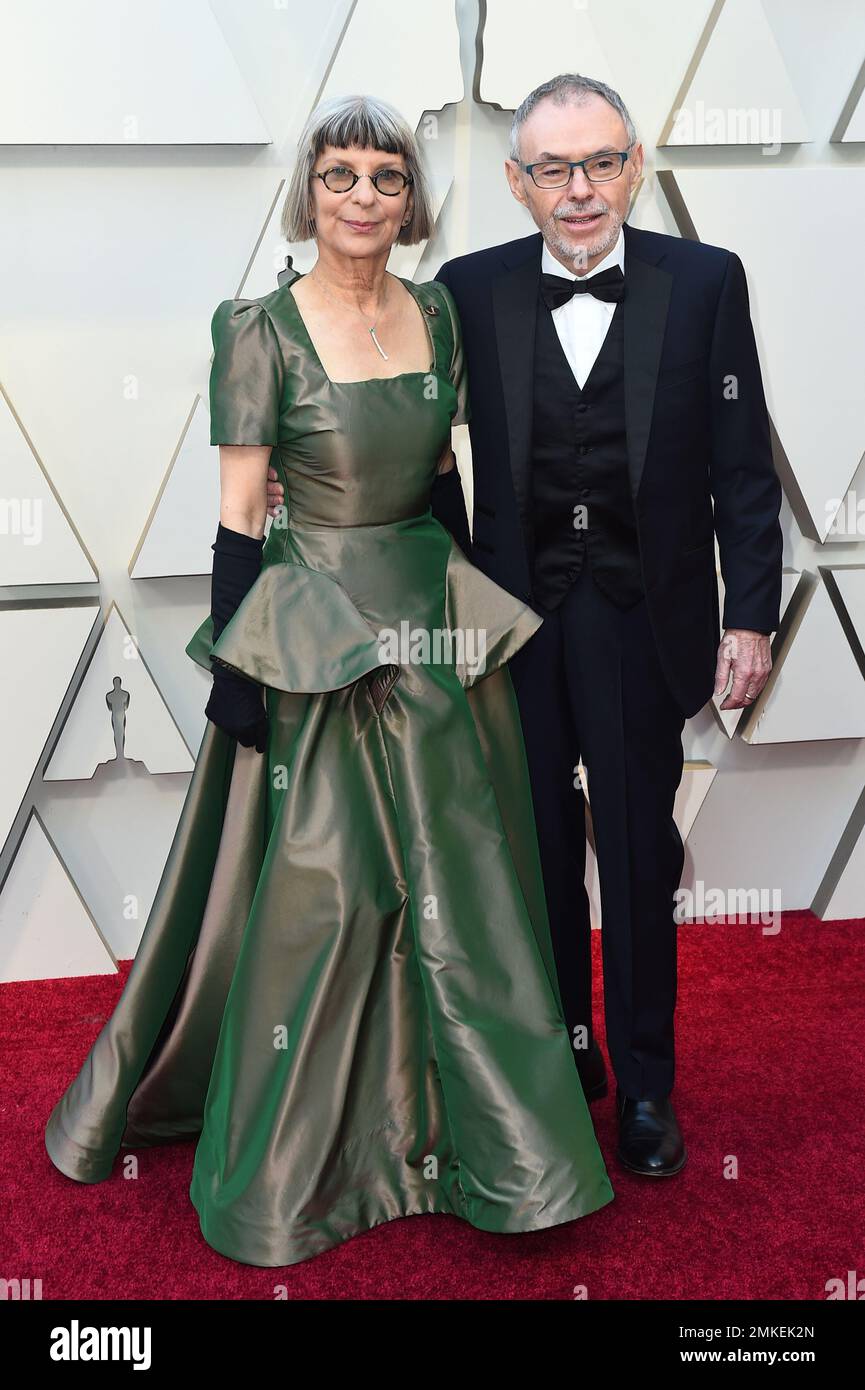 Lois Burwell, left, and John Toll arrive at the Oscars on Sunday, Feb ...