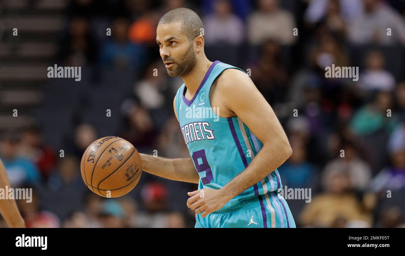 Charlotte Hornets guard Tony Parker (9) brings the ball up court