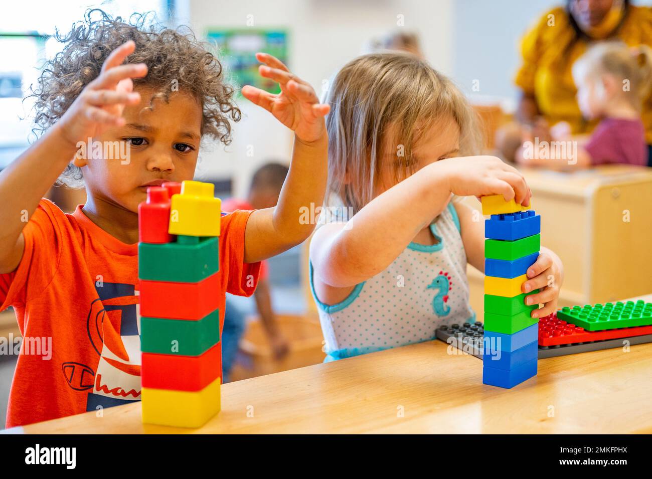 Children from the Malmstrom Child Development Center play with toys