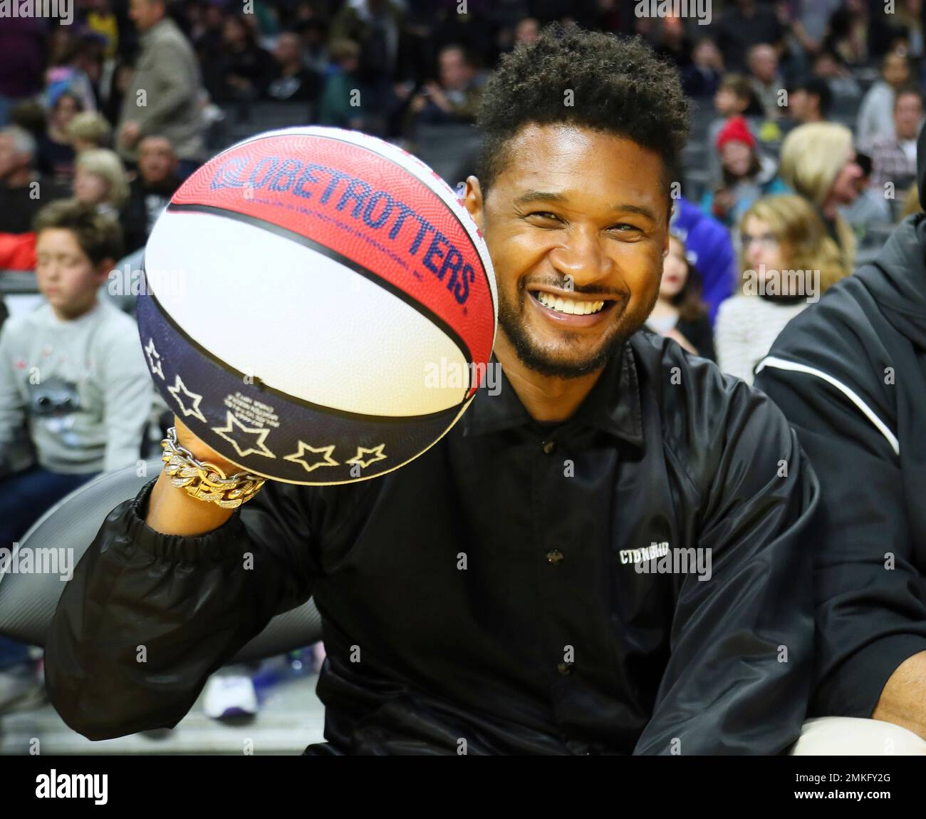 Usher attends The Harlem Globetrotters game at Staples Center on Feb