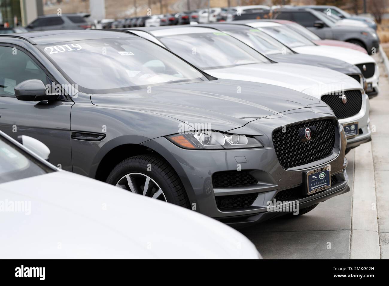 FILEIn this Sunday, Feb. 17, 2019, file photograph, unsold Jaguar FPace sports utility