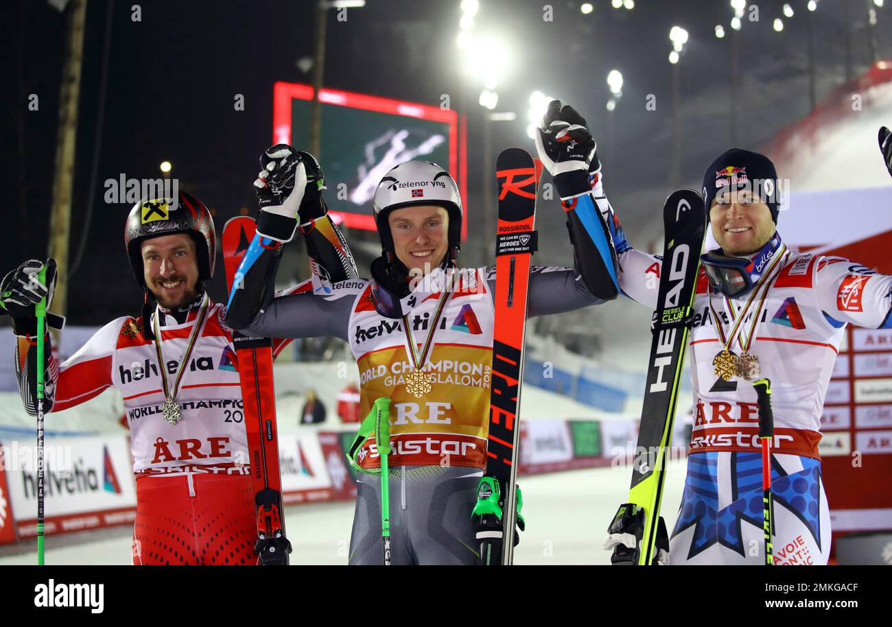 Norway's Henrik Kristoffersen, center, winner of the men's giant slalom,  poses with second placed Austria's Marcel Hirscher, left, and third placed  France's Alexis Pinturault, at the alpine ski World Championships in Are,