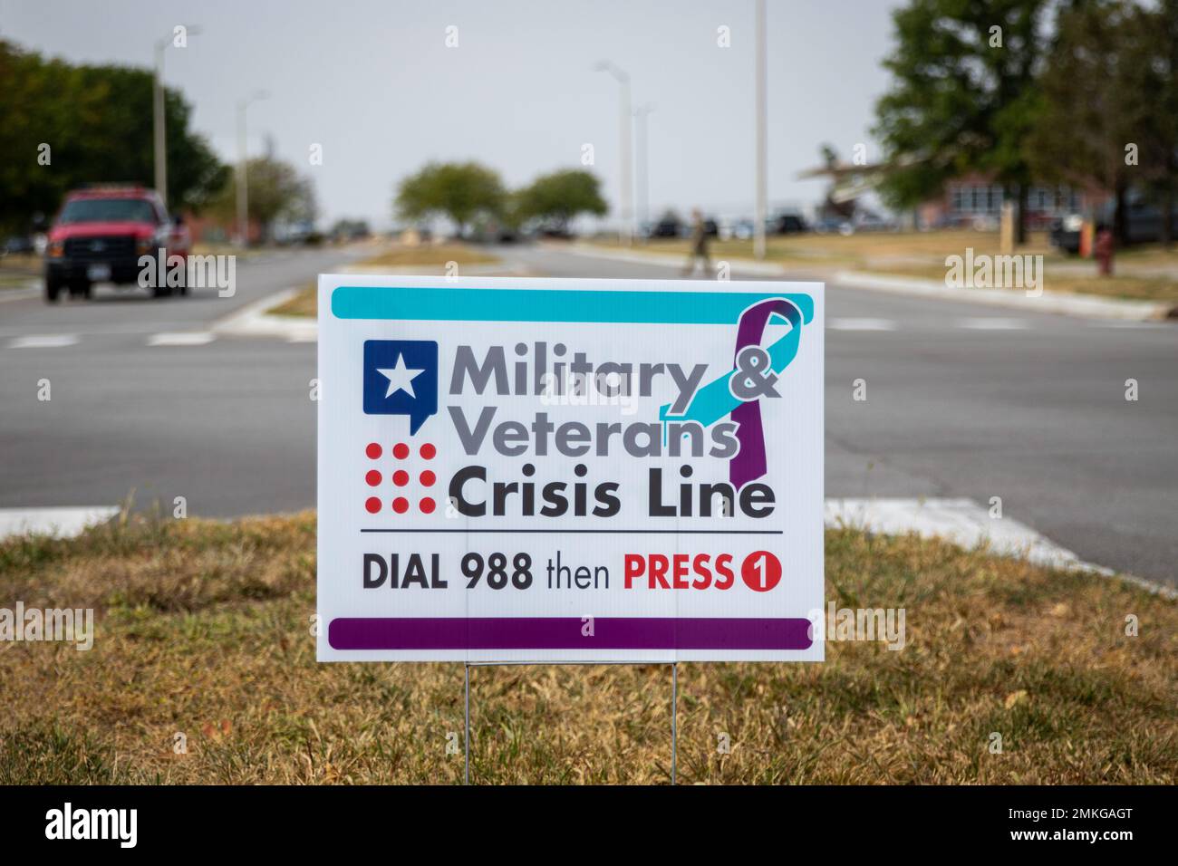 A sign for the Military and Veterans Crisis Line reading “Dial 988 then Press 1” is seen at the entrance to the Nebraska National Guard air base in Lincoln, Nebraska, on Sept. 9, 2022. September is National Suicide Prevention Awareness Month and Sept. 10, 2022 is World Suicide Prevention Day. If you or someone you know is experiencing thoughts of suicide, know that you are not alone and that someone is always available to listen. Free and confidential support is available 24/7, 365 days a year with the National Veterans Crisis Line. Dial 988 then press 1 to get connected to a caring, qualified Stock Photo