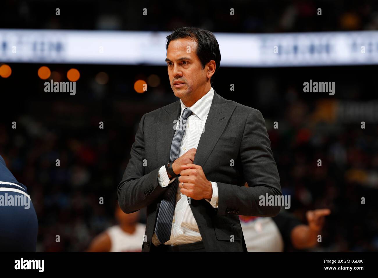 Miami Heat head coach Erik Spoelstra, right, presents a 2011-12