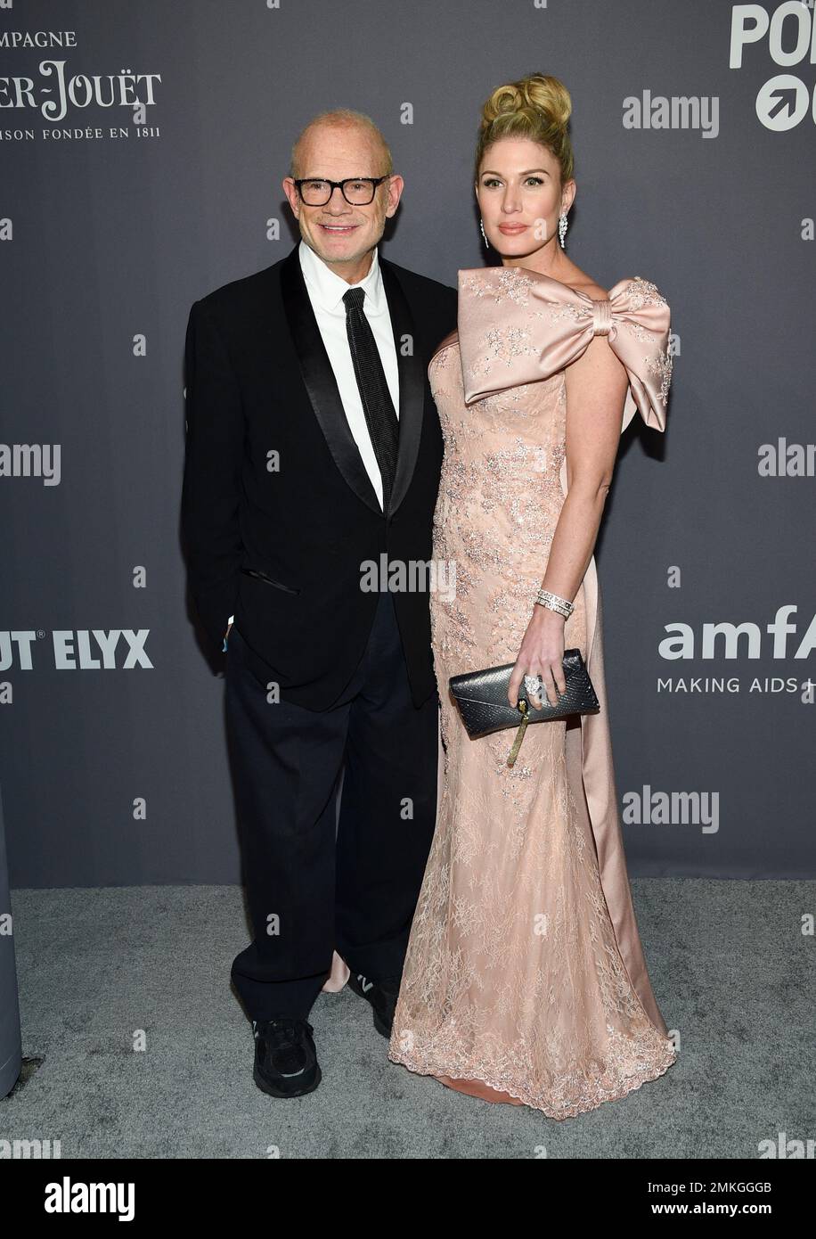 Bill Roedy, left, and Hofit Golan attend the amfAR Gala New York AIDS