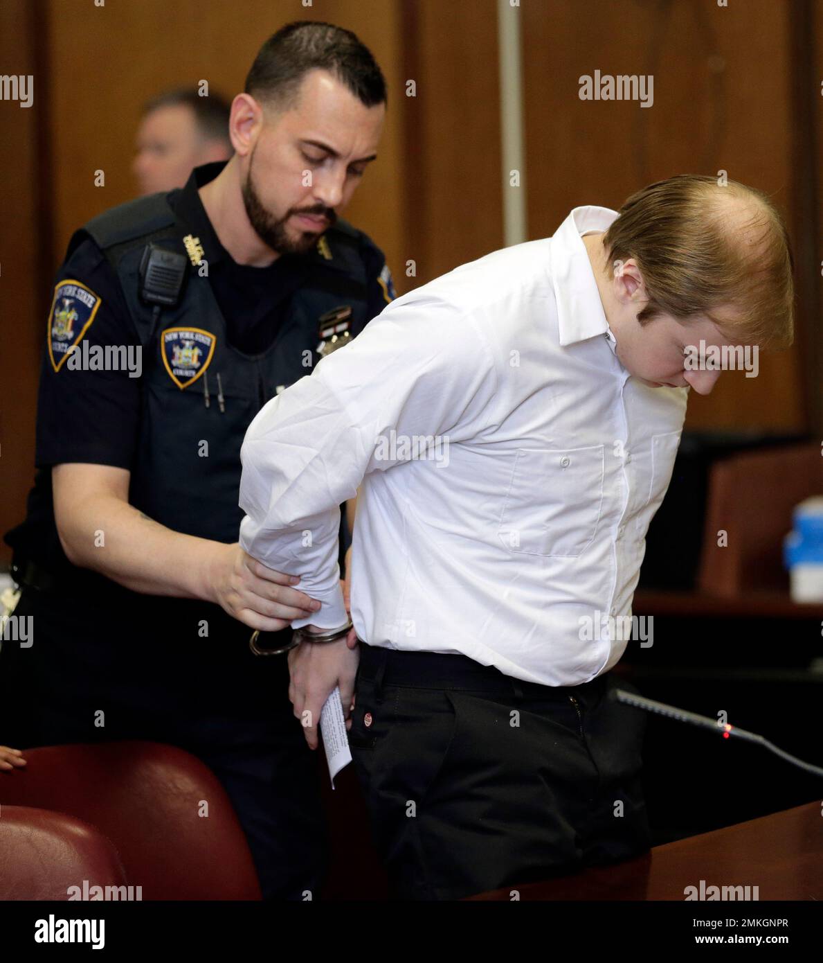 James Jackson is handcuffed after his sentencing in New York, Wednesday ...