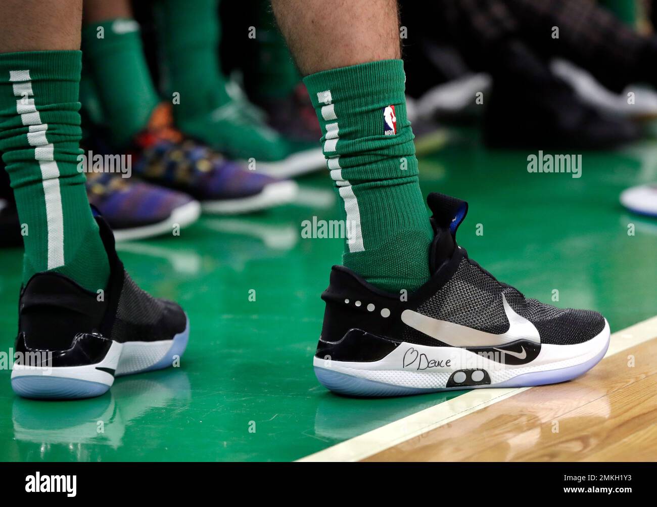 In this Feb. 7, 2019 photo, Boston Celtics forward Jayson Tatum stands at  the bench area during an NBA basketball game against the Los Angeles Lakers  in Boston. He is wearing Nike's