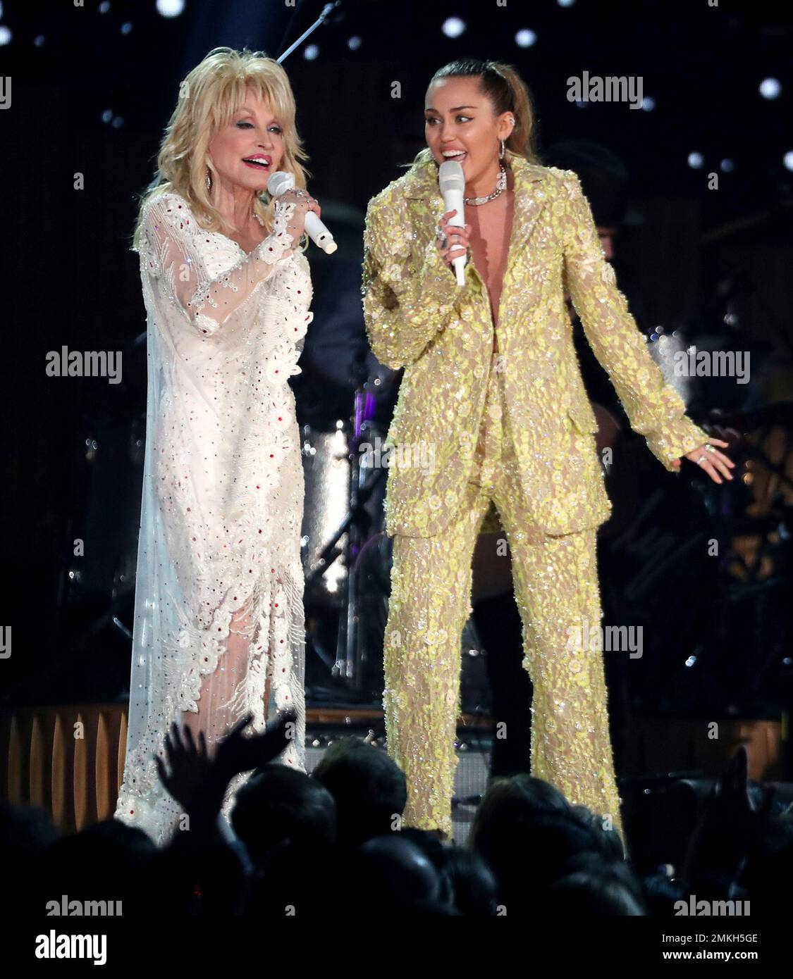 Dolly Parton, left, and Miley Cyrus perform "Jolene" at the 61st annual Grammy Awards on Sunday