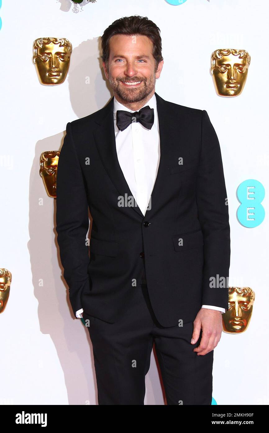 Director and actor Bradley Cooper poses for photographers upon arrival