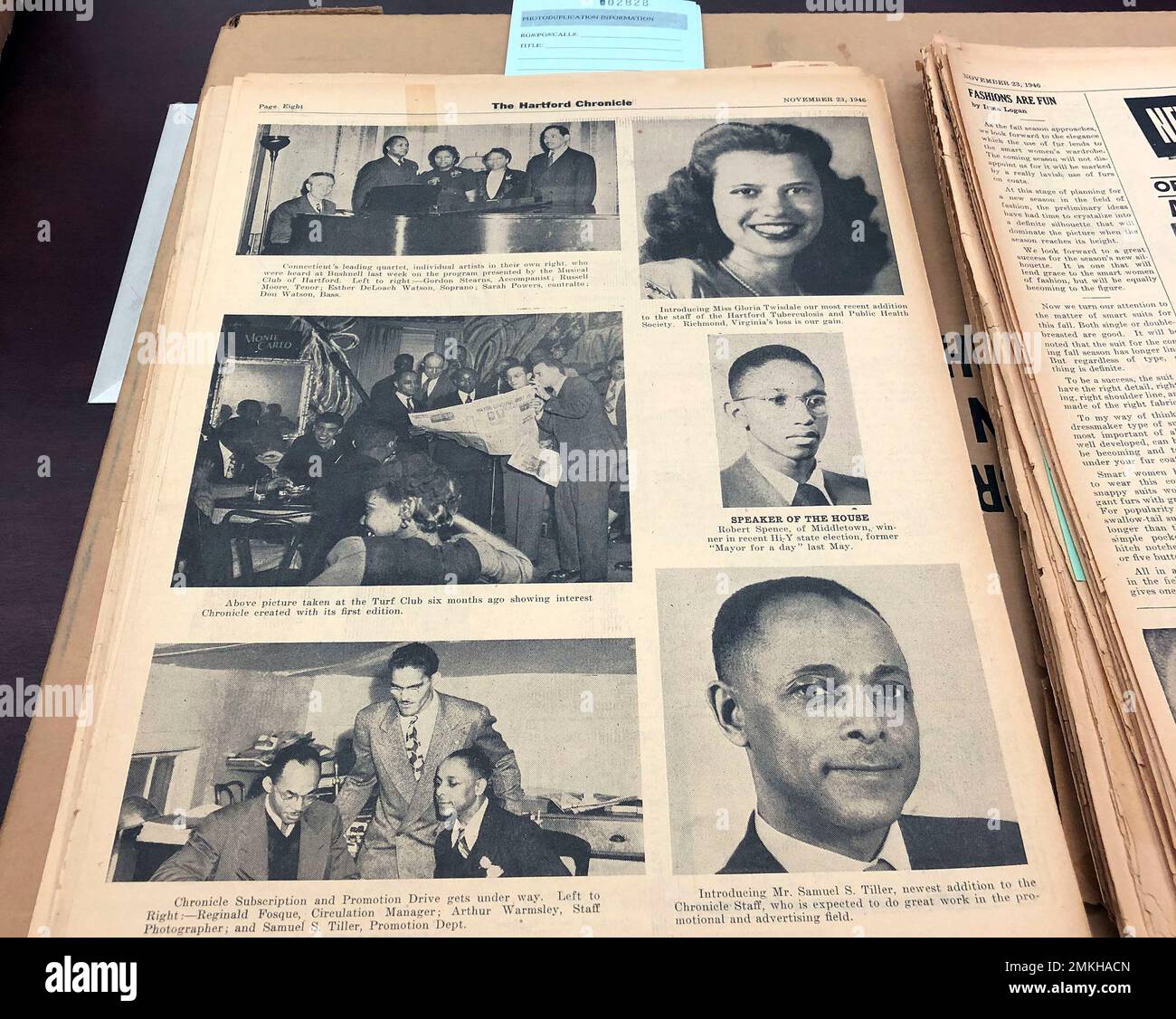This Nov. 29, 2018, photo shows a Nov. 23, 1946, page highlighting some of the staff of the