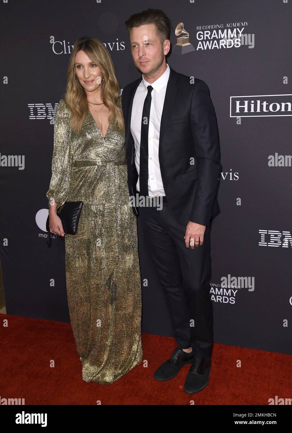 Genevieve Tedder, left, and Ryan Tedder arrive at the Pre-Grammy Gala