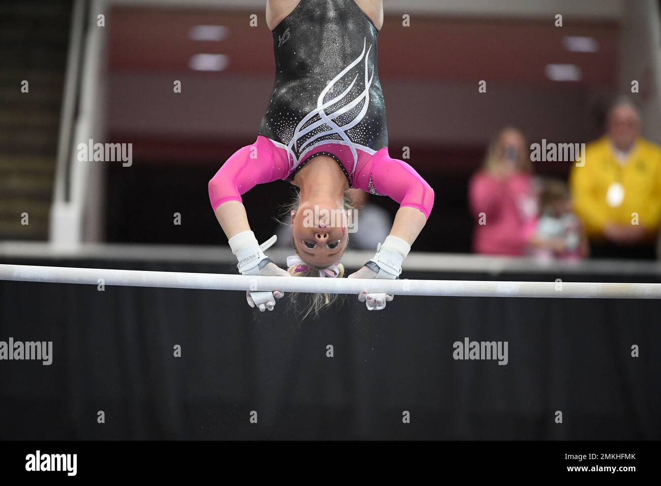 Arkansas gymnast Sydney Laird competes on the bars against Alabama