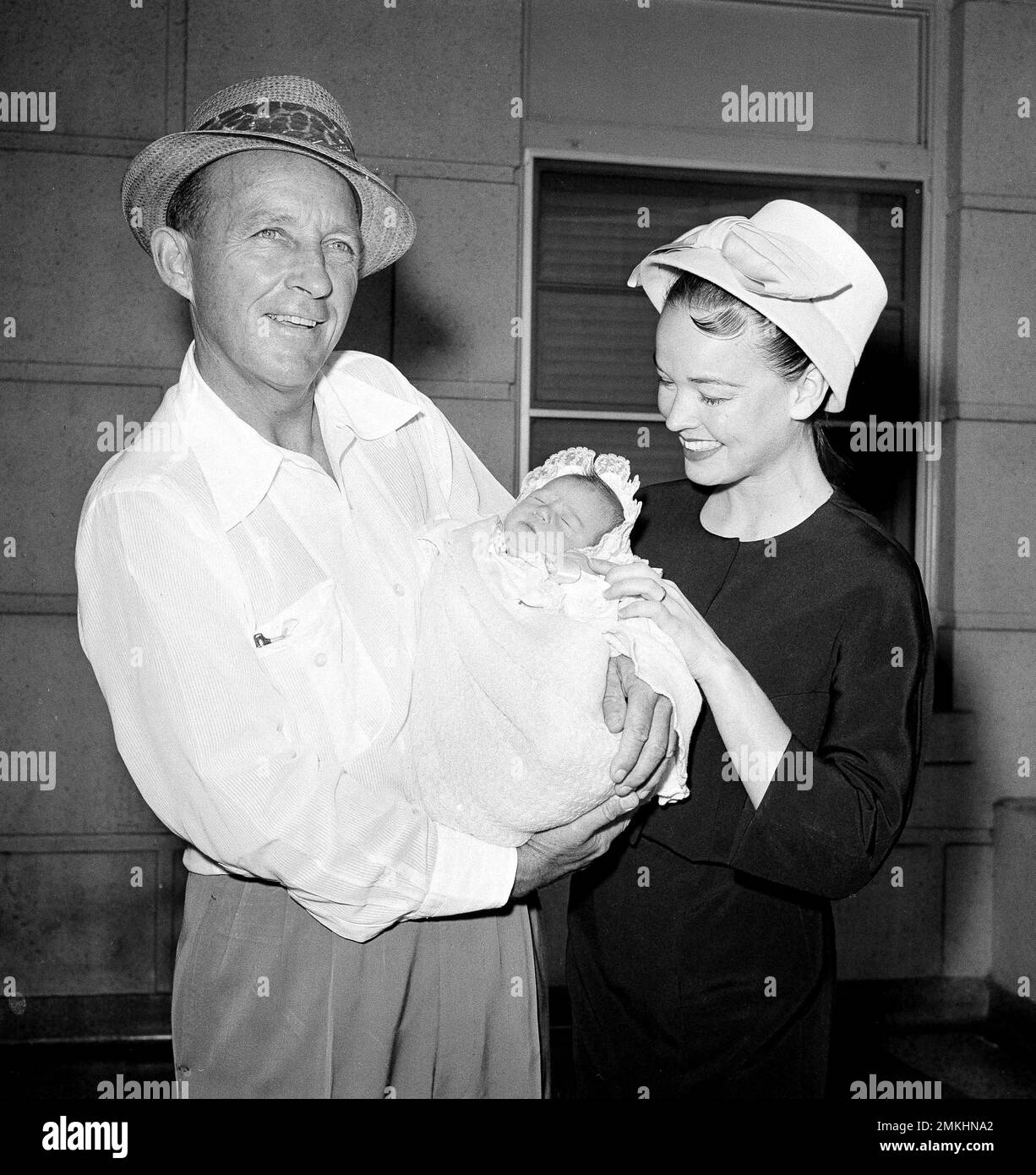Bing Crosby, delighted to be the father of a daughter after five sons