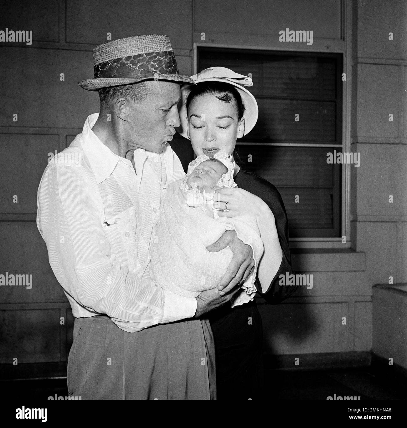 Bing Crosby, delighted to be the father of a daughter after five sons