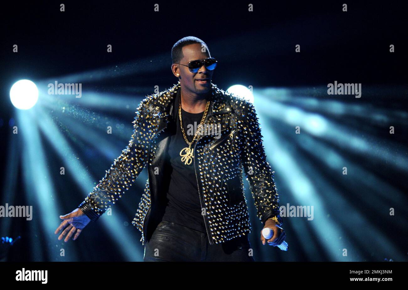 FILE - In this June 30, 2013 file photo, R. Kelly performs at the BET ...