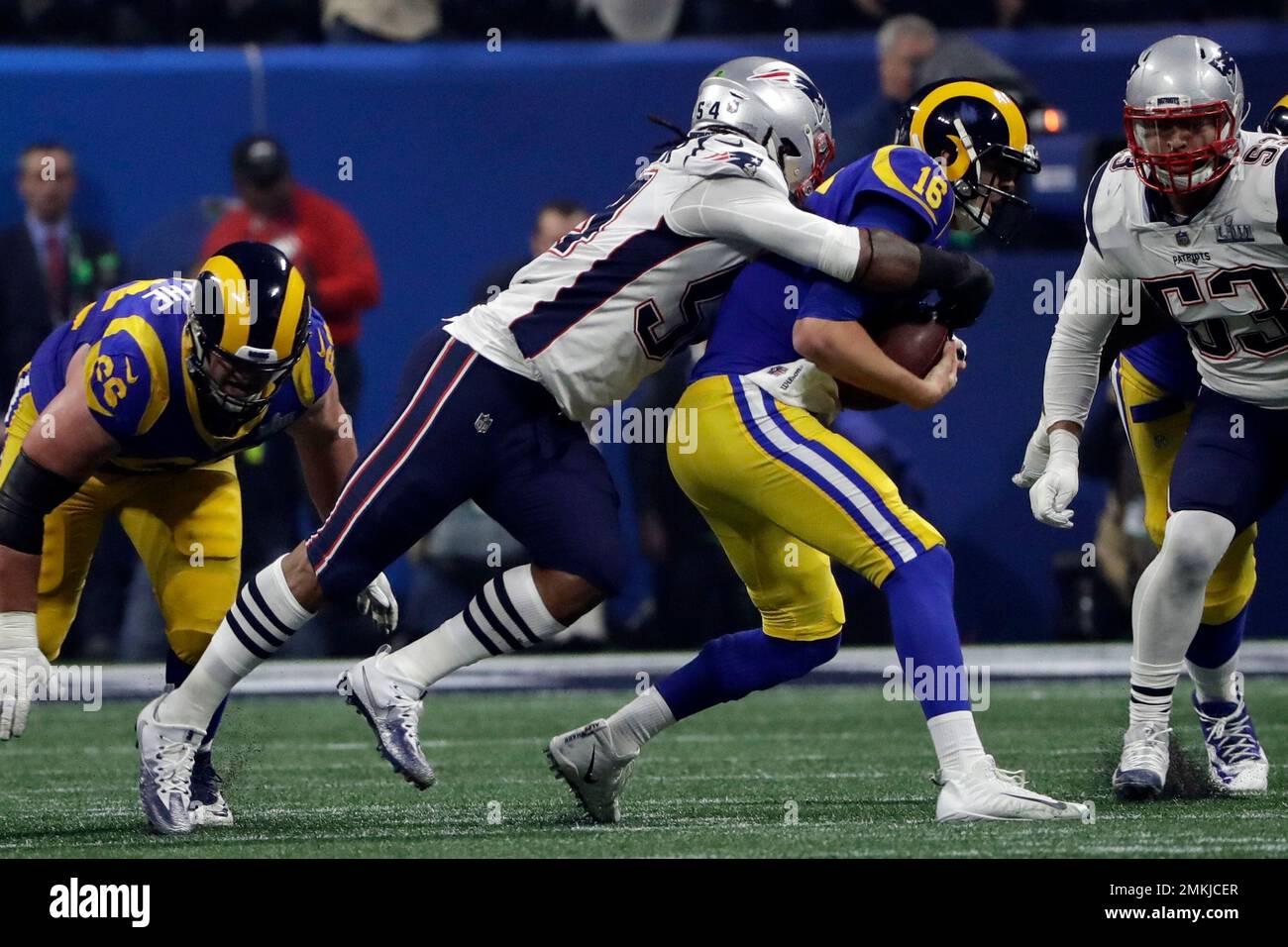 Los Angeles Rams quarterback Jared Goff (16) is sacked by New England  Patriots defensive end Trey Flowers (98) and Patriots linebacker Dont'a  Hightower (54) in the second quarter of Super Bowl LIII